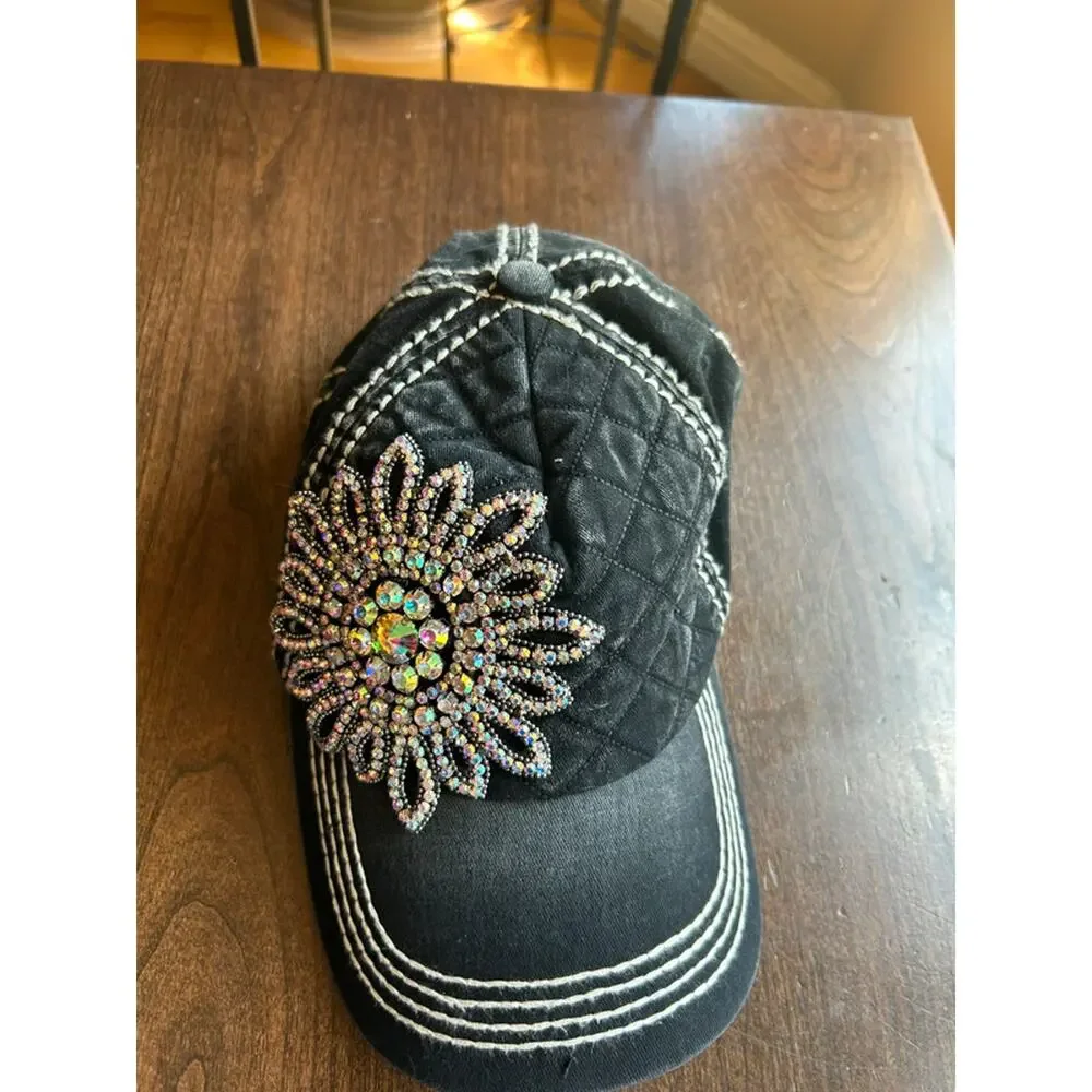 Olive & Pique quilted baseball cap featuring an iridescent rhinestone flower